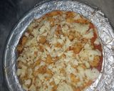 A picture of step 4 of Chéésy cheese 🧀 chicken 🐔 pizza 🍕🍕.