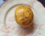 A picture of step 1 of Jacket potato.