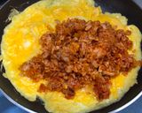 A picture of step 6 of Japanese Egg Wrapped Tomato Chicken Rice (Omu Rice).