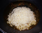 Foto del paso 2 de la receta: Arroz desglazado con cilantro cimarrón y ajo