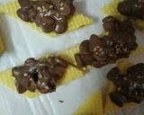 A picture of step 4 of Chocolate peanut cluster on wafers with sesame.