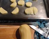 Foto del paso 2 de la receta Alitas al horno con patatas y cebolla