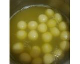A picture of step 11 of Angoori Rasmalai.