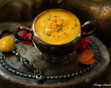 A picture of step 2 of Creamy sweetened Aamras.