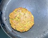 A picture of step 3 of Lobia chilla loaded with veggies.