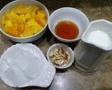 A picture of step 1 of Honey Mango Shake.