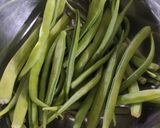 A picture of step 1 of Gavar potato nutty sabji.