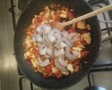 A picture of step 3 of Thai Basil Shrimp, Tomato, and Egg Fried Rice.