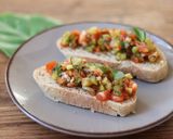 A picture of step 2 of Bruschetta With Green Tomato and Thai Basil 🌿 🍅.