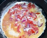 A picture of step 8 of Toasted Bread with Fried Eggs and Baked Beans.