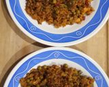 A picture of step 7 of Paella Rice with Chicken and Vegetables.