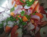 A picture of step 3 of Onian tomato carrot salad.