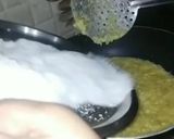 A picture of step 3 of Coconut burfi using milk powder.