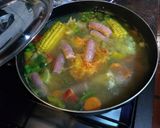 Foto del paso 2 de la receta: Puchero de matambrito de cerdo con salchicha criolla