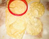 A picture of step 22 of Fateera with hotdog filling.