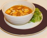 A picture of step 9 of LEHSUNI PANEER gravy.