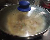 A picture of step 3 of Vada Pav omelette.