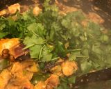 A picture of step 7 of “Snowed in” chicken and aubergine curry ❄️🌶.