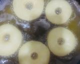 A picture of step 9 of Doughnuts.