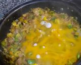 Foto del paso 5 de la receta: Cocinando con zapallitos, cebolla y huevo