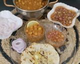 A picture of step 18 of Chur Chur Naan Thali Chole Imli pyaaz chutney laccha pyaaz Chur chur Naan (Punjabi Dinner Thali).
