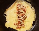 A picture of step 9 of Curry Chicken Egg Cheese Tortilla Wrap.