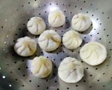 A picture of step 4 of Handmade traditional modak-dipped in chocolate.