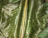 A picture of step 7 of Ilish macher paturi (Hilsa fish paturi).