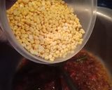 A picture of step 2 of Chane ki daal pulao.