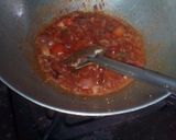 A picture of step 16 of Lemon rice and prawn curry.