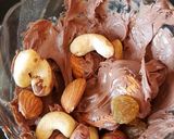 A picture of step 2 of Chocolate coated nuts.