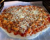 A picture of step 3 of Kimchi pizza.