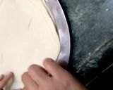 A picture of step 13 of Chapathi spring rolls.