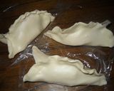 Foto del paso 6 de la receta: Empanadas salchicha, queso y tomate