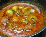 A picture of step 7 of Stuffed onion potato sabzi.