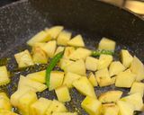 A picture of step 2 of Thakurbari special Narkel Aloo Chorchori.