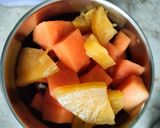 A picture of step 1 of Papaya Pina punch.