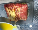 Foto del paso 5 de la receta: Lomo en libro en salsa de naranja