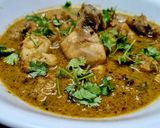 A picture of step 4 of Lonka Roshun Pora Masala Chicken.