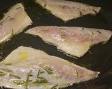 A picture of step 3 of Lemon and rosemary pan fried sea bass with sautèed potatoes.