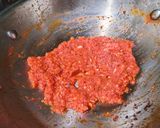 A picture of step 2 of Creamy Red sauce Farfalle Pasta with green peas.