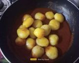 A picture of step 7 of Lasaniya Bhungla Batata.