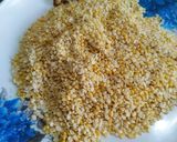 A picture of step 1 of Moong and urad dal ladoo.