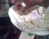 A picture of step 5 of Cardamon mandazis.