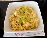 A picture of step 4 of My Egg fried Rice with the malaysian curry sauce.