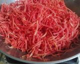 A picture of step 2 of Gajar ka halwa.
