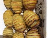 A picture of step 3 of Hassleback rosemary and garlic new potatoes.
