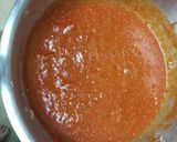A picture of step 2 of Stuffed Bell Peppers in a Red Sauce.