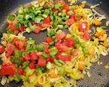 Foto del paso 7 de la receta: Alitas de pollo con verduras