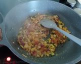 A picture of step 2 of Madurai egg kari dosa.